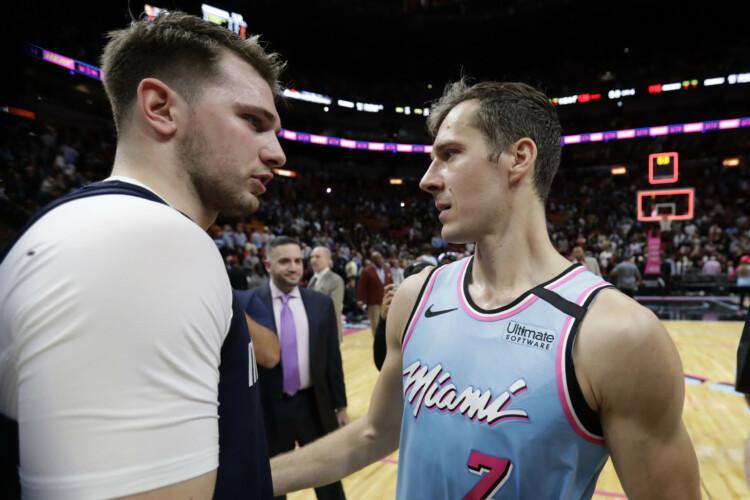 Luka Dončičs (Dalasas "Mavericks") un Gorans Dragičs (Maiami "Heat")