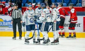 Ralfs Freibergs ar komandas biedriem